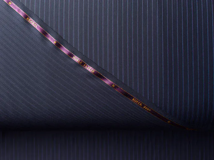 Close-up of navy blue striped fabric from H.M. Cole collection.